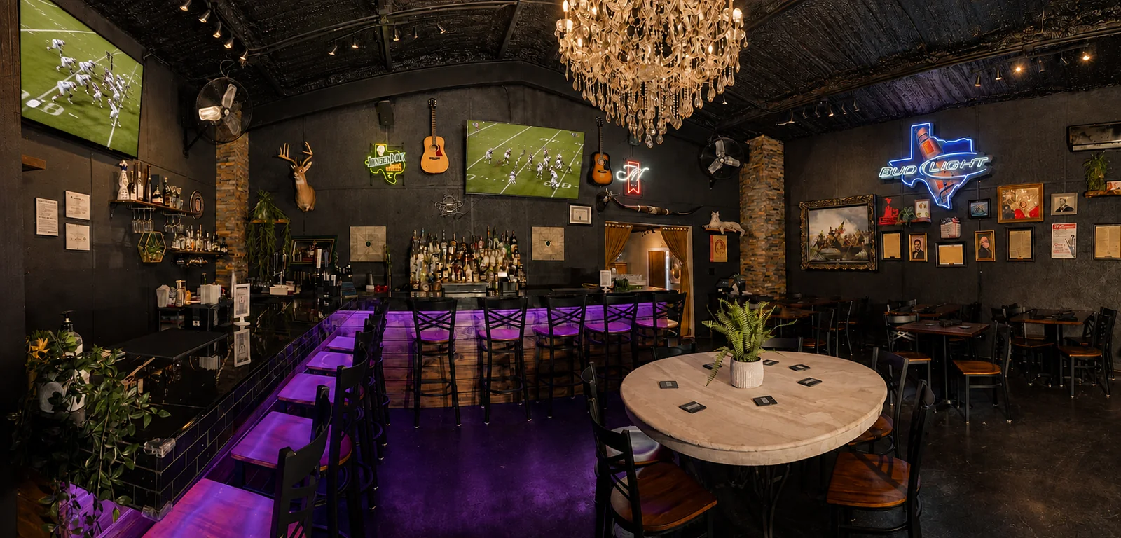 Patriot Bar at Elements by 456 with purple-lit bar, seating, and televisions